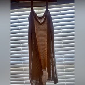 Free people knit sweater with shoulder slits.